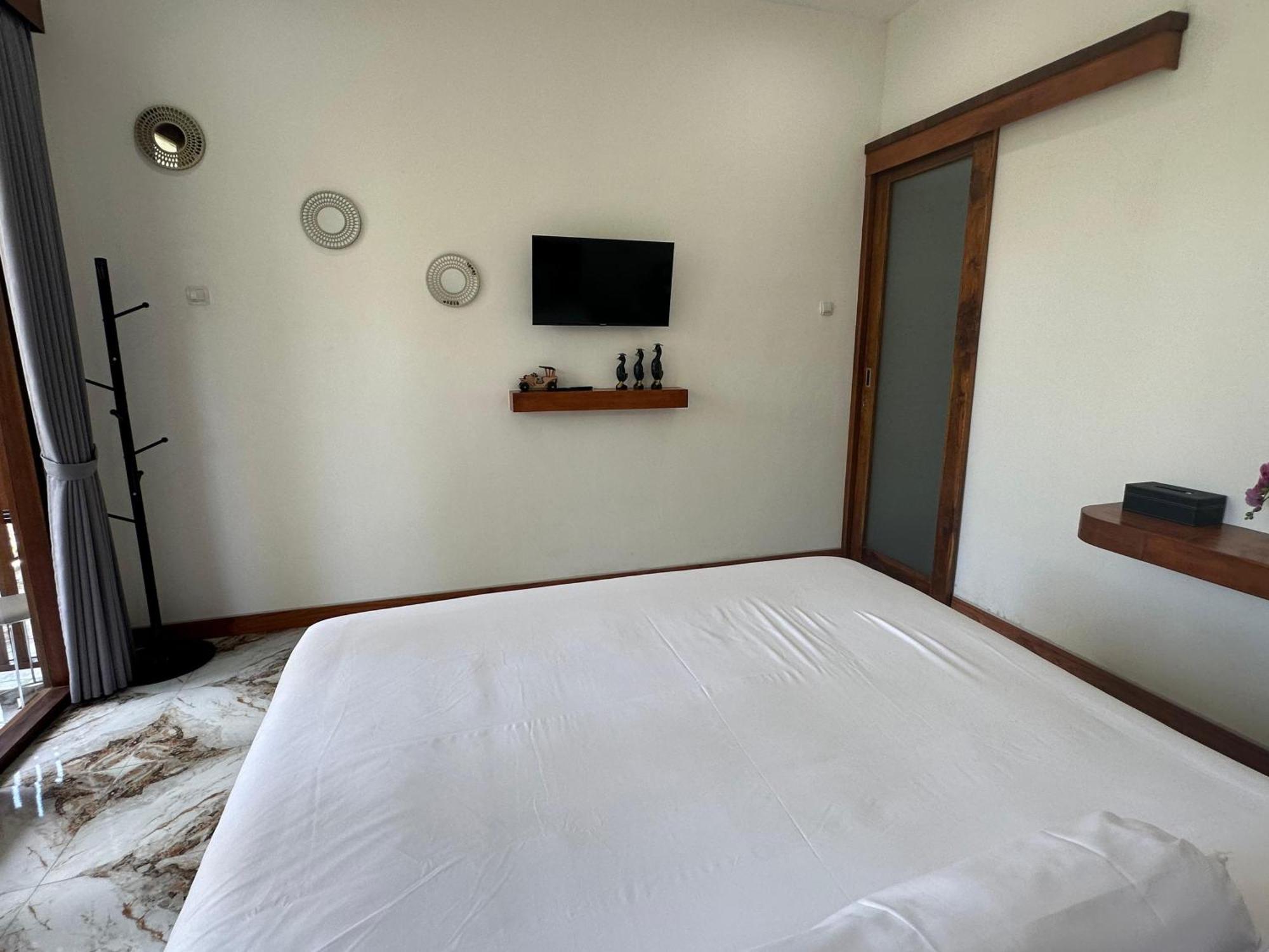 Апартаменты Umah Yugadi Bali Мундук Экстерьер фото